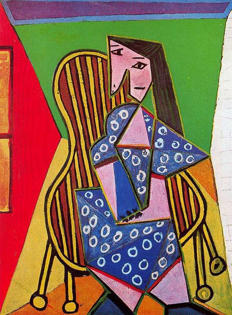 Woman in striped armchair