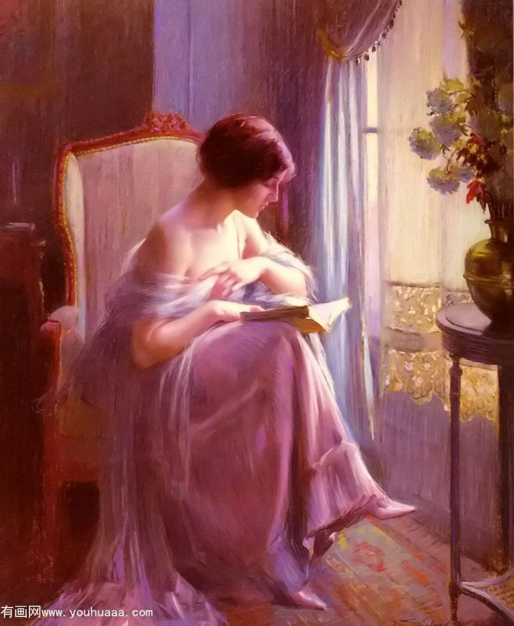 young woman reading by a window