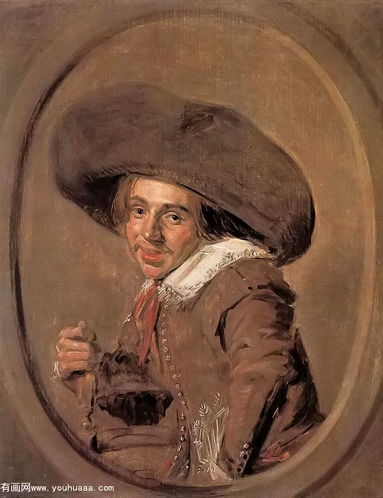 a young man in a large hat