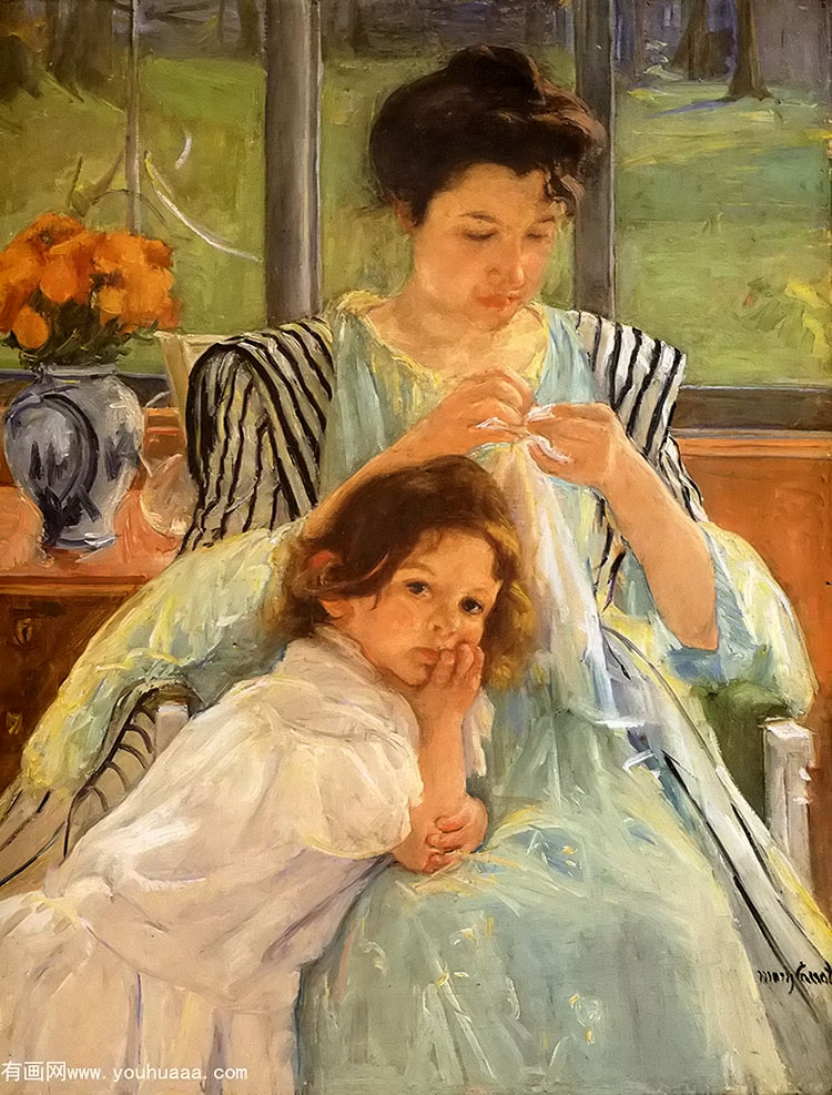 young mother sewing