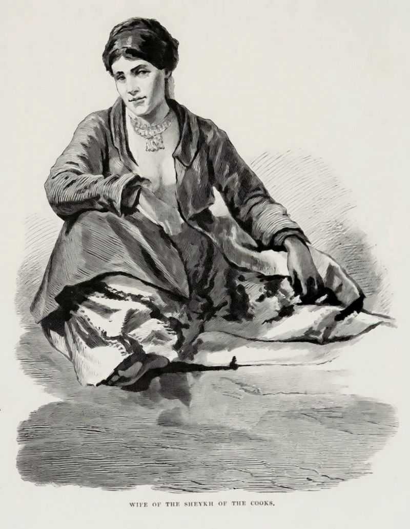 A woman sitting facing the artist