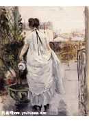 Young Woman Watering a Shrub