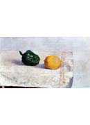 Pepper and Lemon on a White Tablecloth