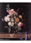 vase of flowers with watch