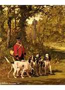 a huntmaster with his dogs on a forest trail