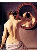 woman standing in front of a mirror