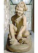 young neapolitan fisherboy playing with a tortoise