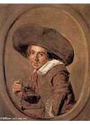 a young man in a large hat